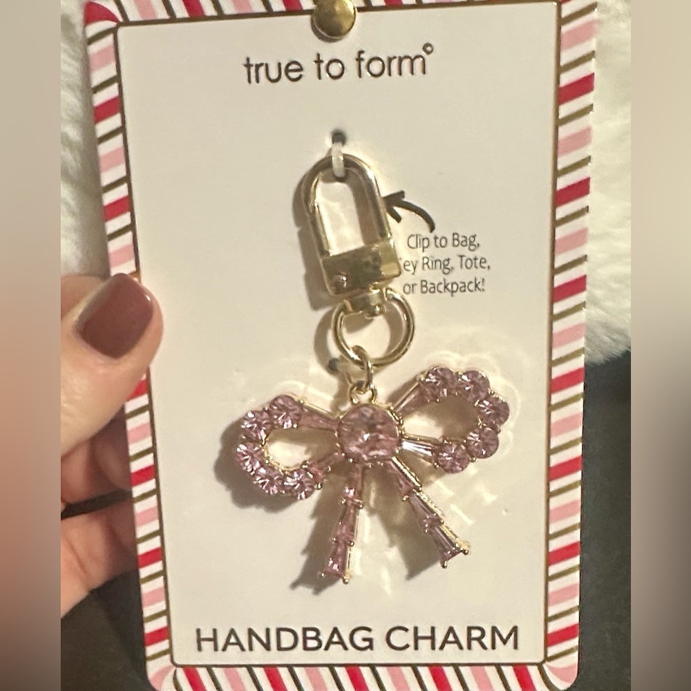 True to form pink gold bow keg chain and bag charm